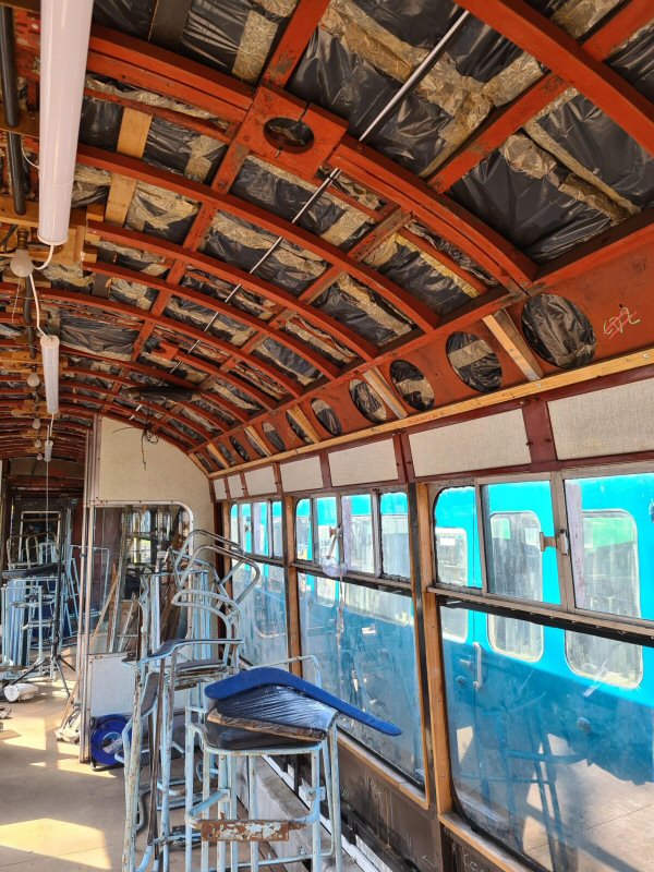 Class 100: Installation of the panels behind the luggage racks